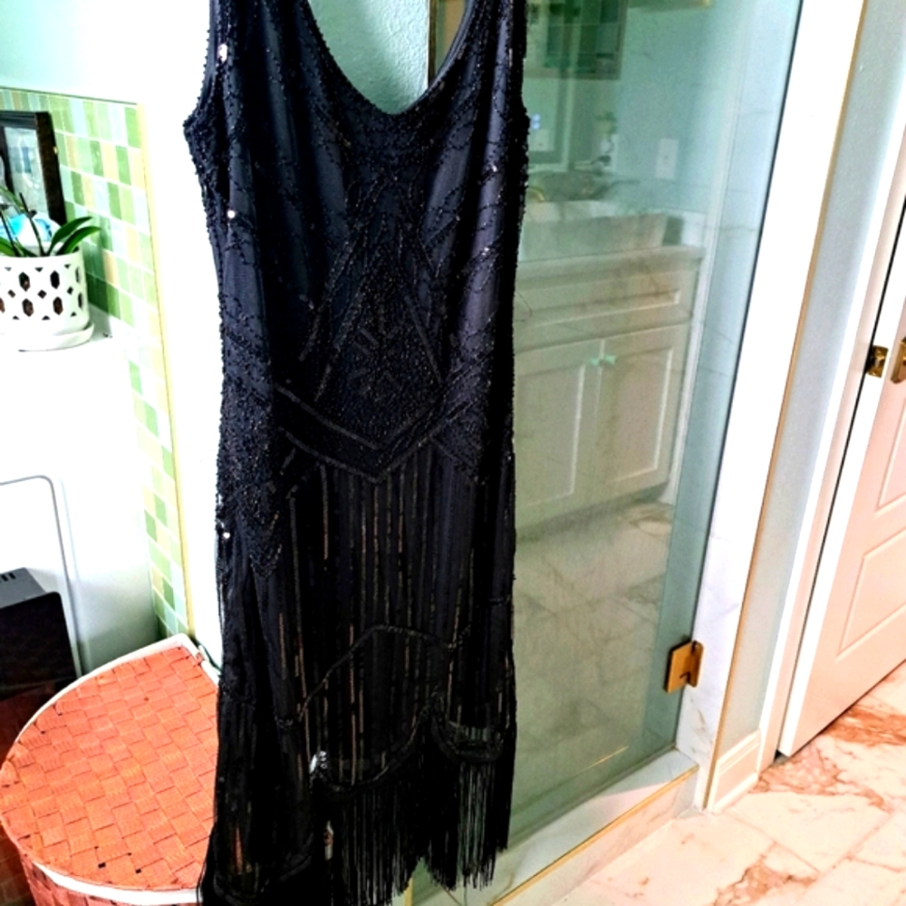 A snazzy, frilly party dress - Picture 2 of 3
